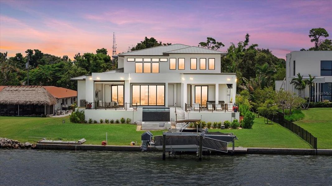 Front exterior of a new home in , Osprey, FL, highlighting curb appeal (Image 23).
