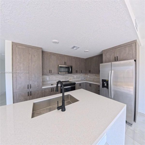 Furnished interior view inside a new home in , Florida City (Image 6). Furnished interior view inside a new home in , Florida City (Image 6).