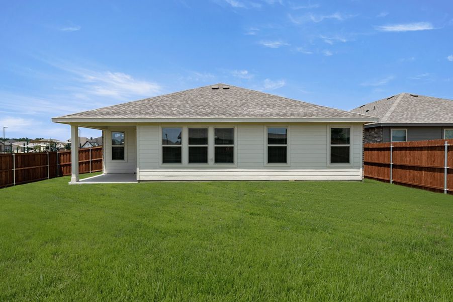 Front exterior of a new home in De Berry Reserve, Royse City, TX, highlighting curb appeal (Image 26). Front exterior of a new home in De Berry Reserve, Royse City, TX, highlighting curb appeal (Image 26).