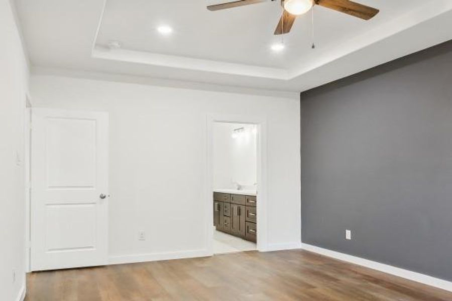 Elevate your primary bedroom with a striking accent wall, adding depth and style to your personal retreat. Elevate your primary bedroom with a striking accent wall, adding depth and style to your personal retreat.