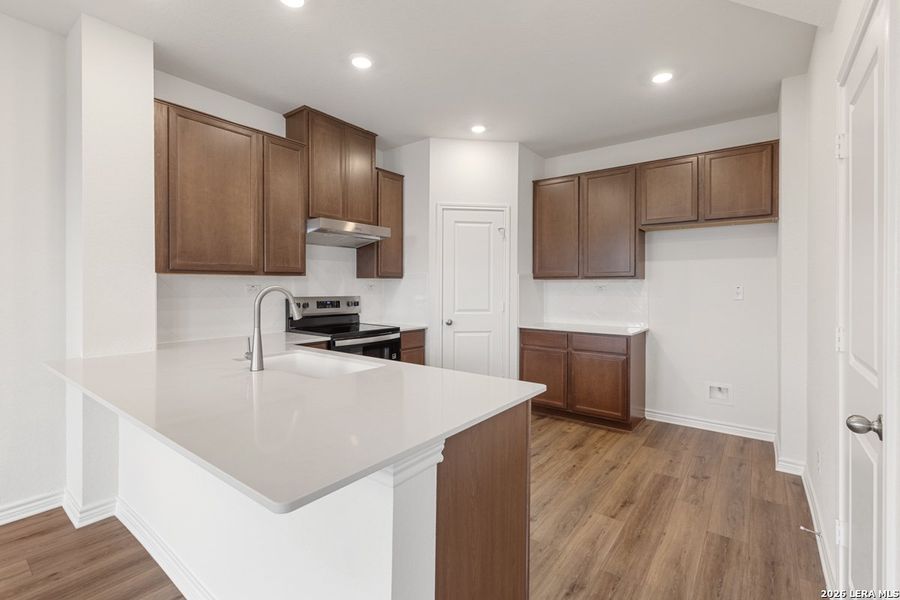 Furnished interior view inside a new home in Woodside Farms, Seguin (Image 9).