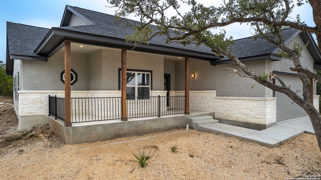 Exterior details and patio area of a home in , Fischer (Image 21). Exterior details and patio area of a home in , Fischer (Image 21).
