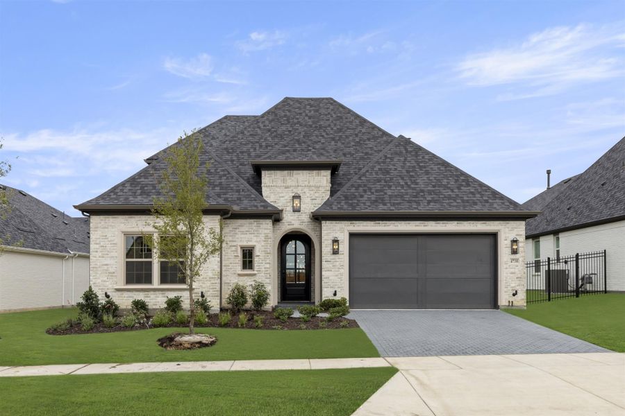 Representative exterior photo of a completed home built from the 4532 by Tradition Homes in Windsong Ranch, Prosper, TX (Image 3).