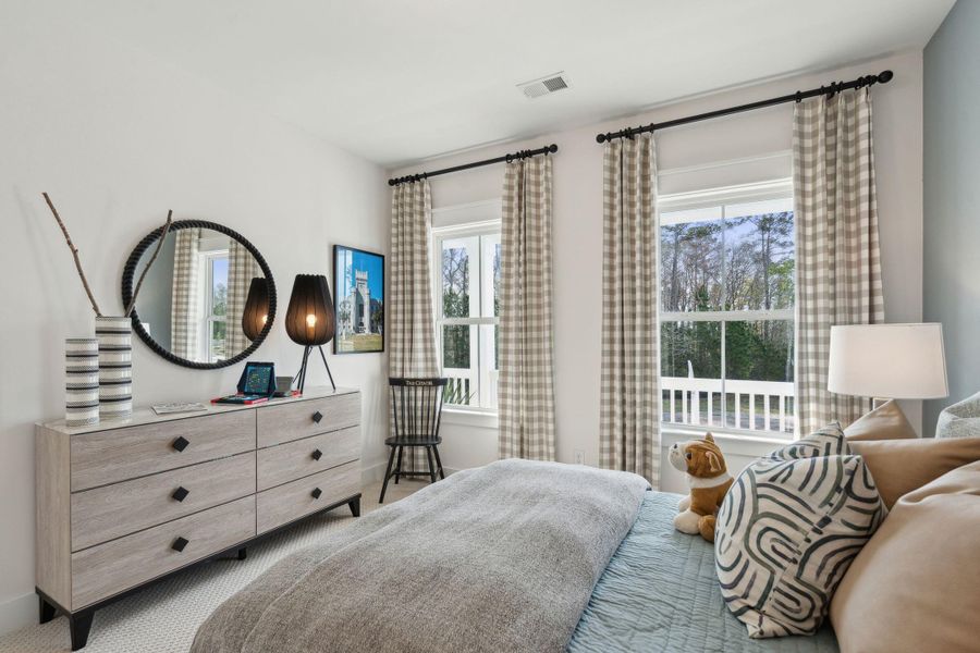 Furnished interior view inside a new home in Tidewater at Lakes of Cane Bay, Summerville (Image 34). Furnished interior view inside a new home in Tidewater at Lakes of Cane Bay, Summerville (Image 34).