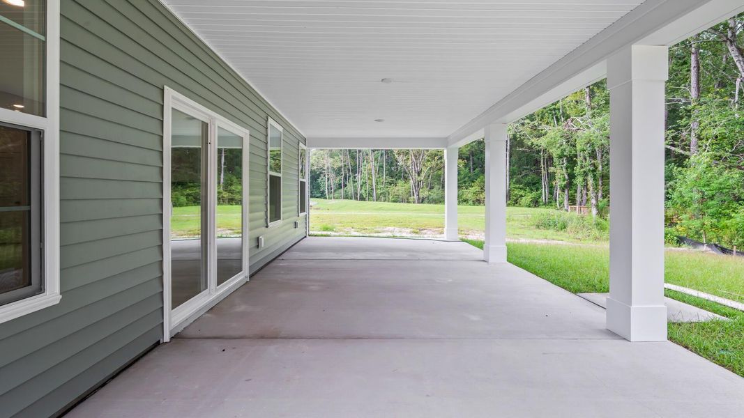 Exterior details and patio area of a home in Creekside at Andrews, Summerville (Image 3).