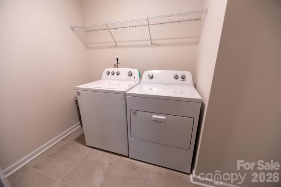 Washer and dryer convey with the home.