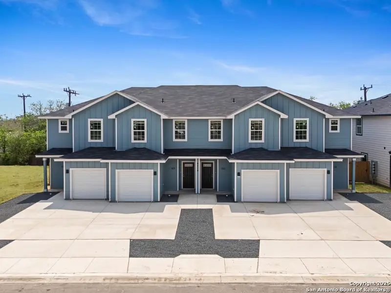 Front exterior of a new home in The Preserve at Candlemeadow, San Antonio, TX, highlighting curb appeal (Image 24).