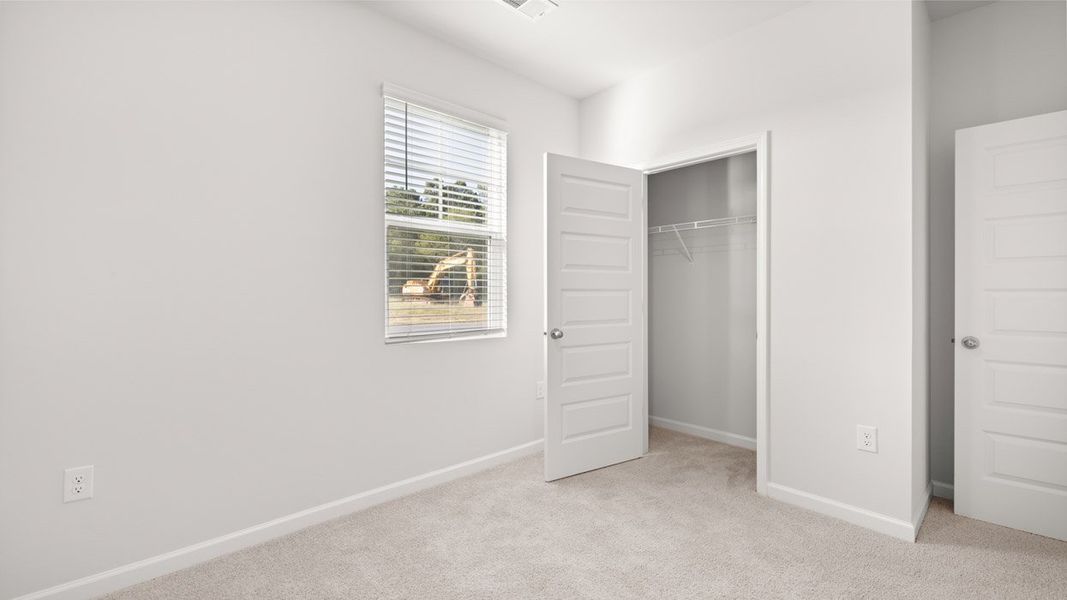Representative unfurnished interior of a home built from the Sullivan by D.R. Horton in Byrd Village, Graniteville (Image 21).