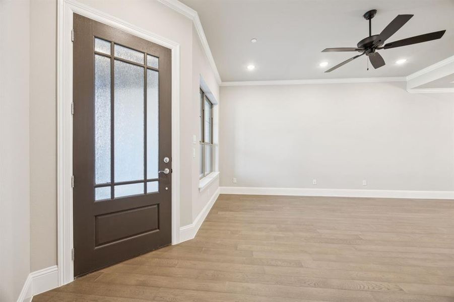 Front door allows plenty of natural light into the living room. Front door allows plenty of natural light into the living room.