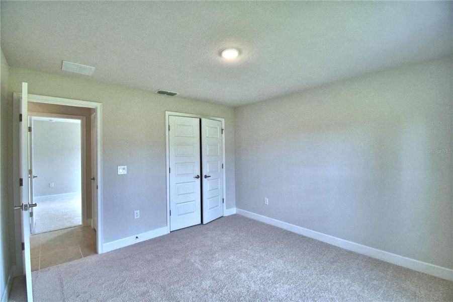 Spacious, unfurnished interior of a new home in Cadence Crossing, Auburndale (Image 60).