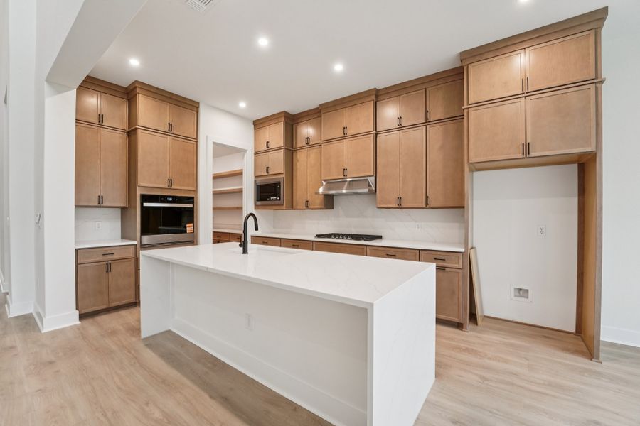 Furnished interior view inside a new home in Sauls Ranch, Round Rock (Image 5).