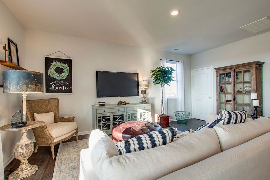 Representative furnished interior of a home built from the SALEM by D.R. Horton in The Parks, White House (Image 14).