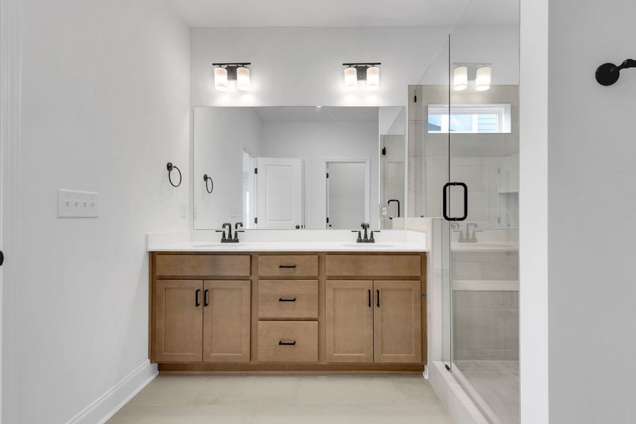 Representative furnished interior of a home built from the Titusville II by Regent Homes in Marlon's Creek, Spring Hill (Image 11).