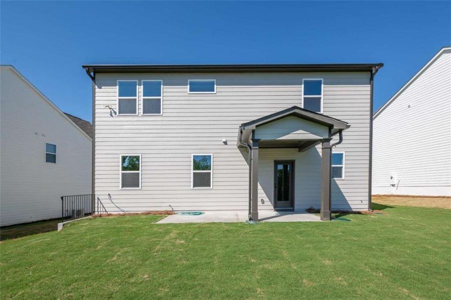Exterior details and patio area of a home in Cambridge at Steels Bridge, Canton (Image 4).