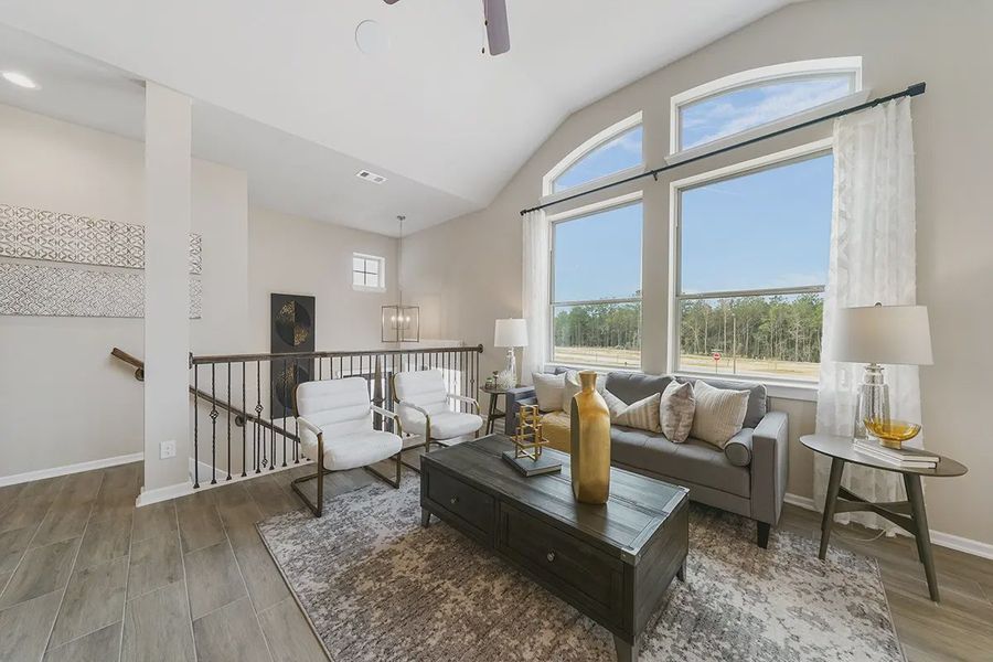 Representative furnished interior of a home built from the Margaux by Chesmar Homes in Meridiana Chateau, Manvel (Image 15).