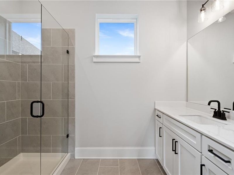 Furnished interior view inside a new home in The Village at Towne Lake, Woodstock (Image 10).