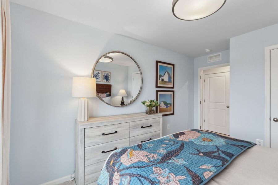 Representative furnished interior of a home built from the The Rutledge by Stanley Martin Homes in Essence at Trinity Townhomes, Columbia (Image 35).