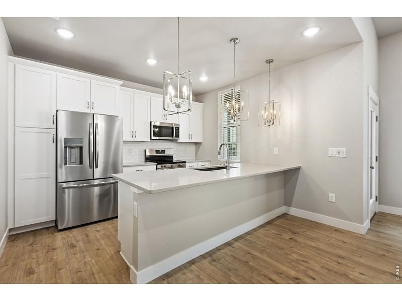 Furnished interior view inside a new home in Northfield at Old Town - Vista Collection, Fort Collins (Image 4).