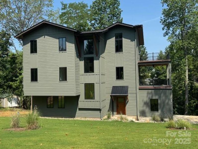 Front exterior of a new home in , Mooresville, NC, highlighting curb appeal (Image 21).