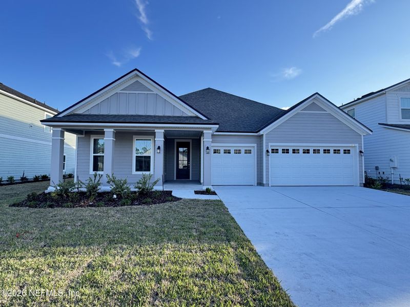 Front exterior of a new home in , Green Cove Springs, FL, highlighting curb appeal (Image 6).