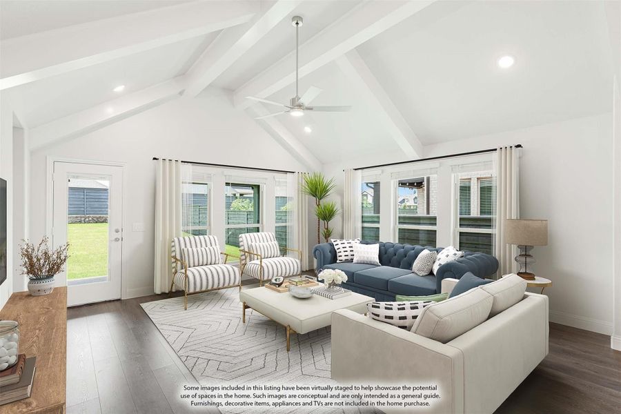 Bright living room with vaulted beamed ceiling, ceiling fan, hardwood floors, and large windows with backyard view. Bright living room with vaulted beamed ceiling, ceiling fan, hardwood floors, and large windows with backyard view.