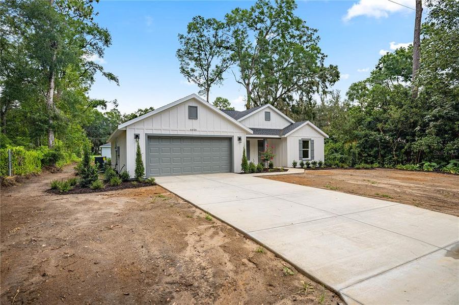 Front exterior of a new home in , Ocala, FL, highlighting curb appeal (Image 18).