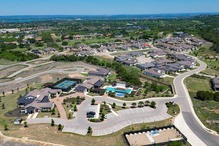 Aerial view of property's location with nearby suburban area