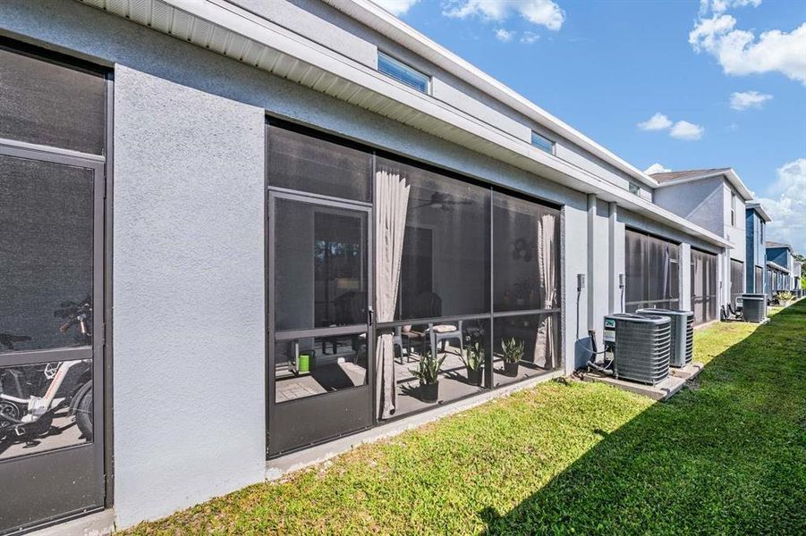 Exterior details and patio area of a home in Azalea Shores, Largo (Image 3).