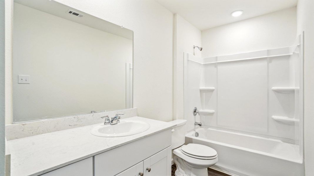 Furnished interior view inside a new home in Castlewood South, Taylor (Image 5).