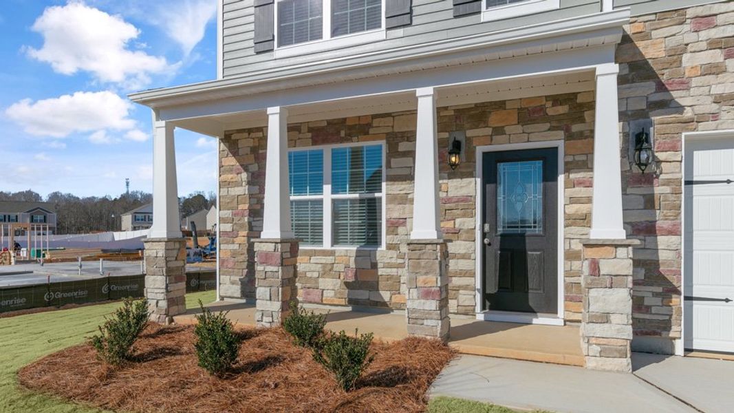 Exterior details and patio area of a home in Ridgewood Farms, Winterville (Image 3).