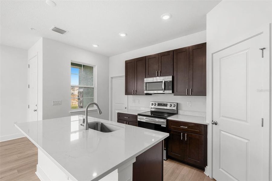 Furnished interior view inside a new home in Magnolia Reserve, Ocoee (Image 8). Furnished interior view inside a new home in Magnolia Reserve, Ocoee (Image 8).