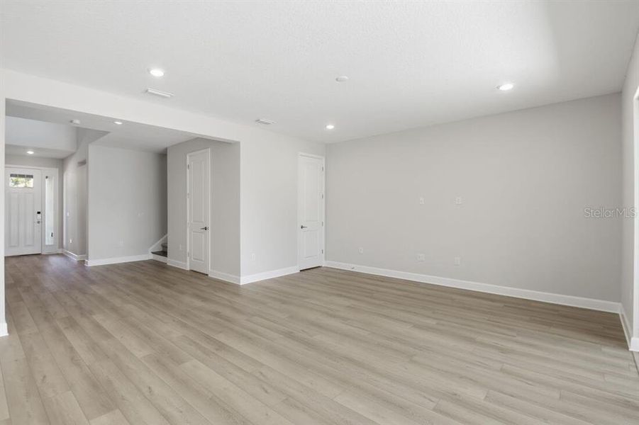 Spacious, unfurnished interior of a new home in Harvest at Ovation, Winter Garden (Image 12).