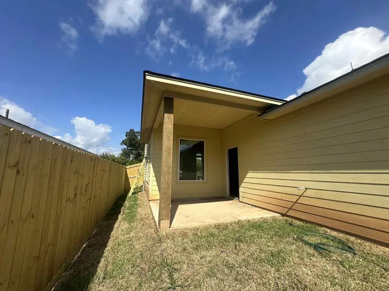 Exterior details and patio area of a home in , Clute (Image 2). Exterior details and patio area of a home in , Clute (Image 2).