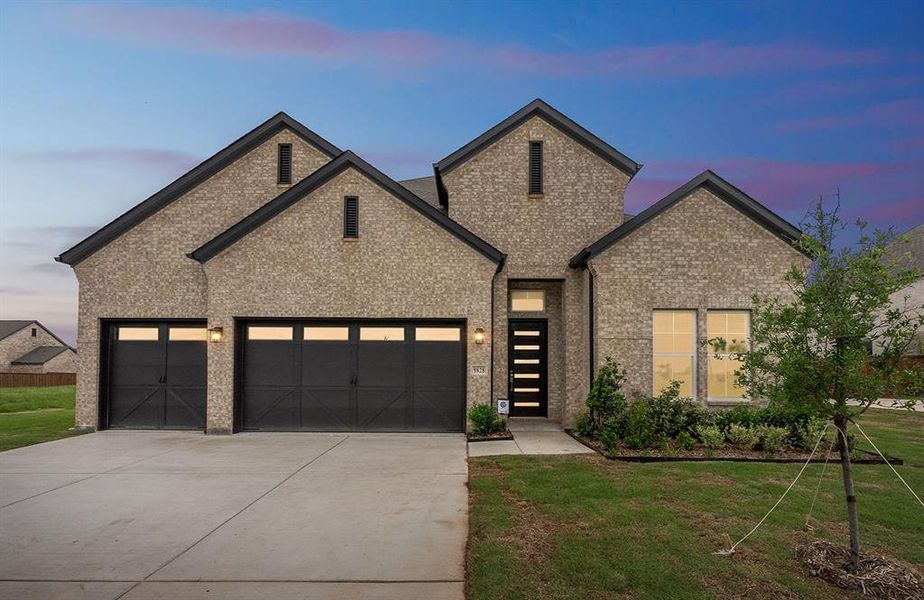 Front exterior of a new home in Polo Ridge, Mesquite, TX, highlighting curb appeal (Image 2). Front exterior of a new home in Polo Ridge, Mesquite, TX, highlighting curb appeal (Image 2).