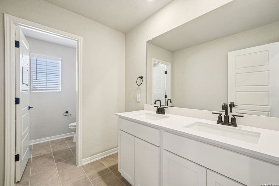 Furnished interior view inside a new home in Estancia Ranch - Classic Series, San Antonio (Image 11).