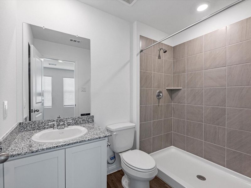 Furnished interior view inside a new home in William Trails, Willis (Image 6).