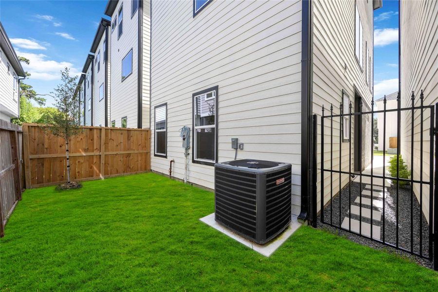 Exterior details and patio area of a home in , Houston (Image 3). Exterior details and patio area of a home in , Houston (Image 3).
