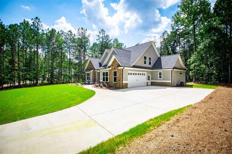 Front exterior of a new home in , Douglasville, GA, highlighting curb appeal (Image 32).