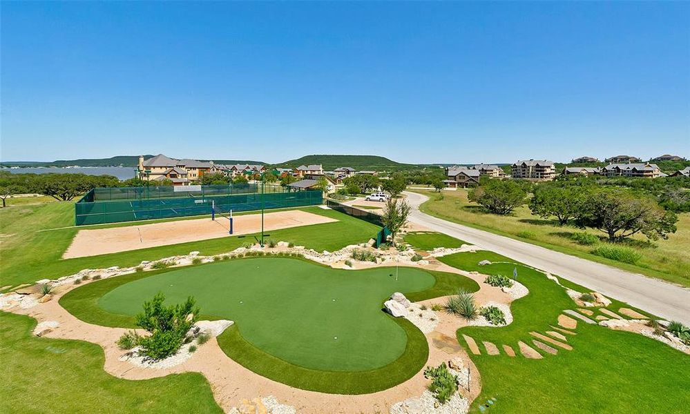 Surrounding community featuring a putting green Surrounding community featuring a putting green