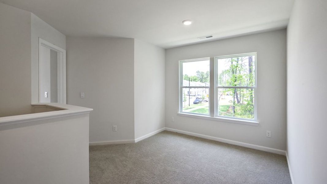 Spacious, unfurnished interior of a new home in Copper Run South, Durham (Image 18).