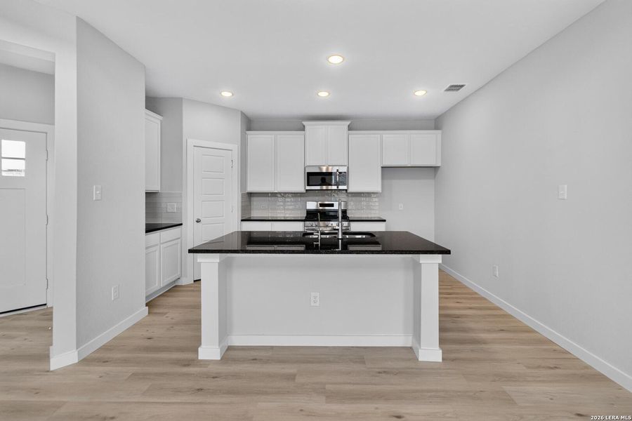 Furnished interior view inside a new home in Hickory Ridge, Elmendorf (Image 10).
