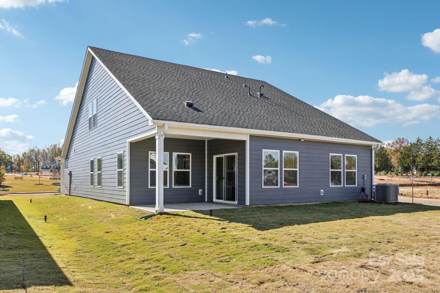 Exterior details and patio area of a home in Brighton Springs, York (Image 4).