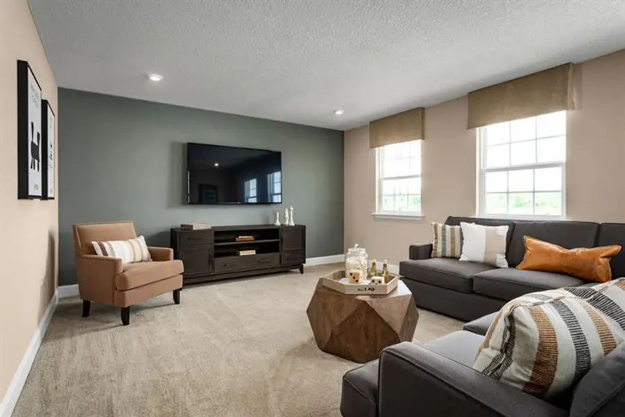 Representative furnished interior of a home built from the Rochelle by Ryan Homes in Bellaviva, Auburndale (Image 11).