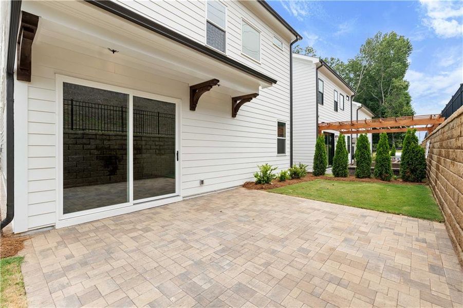 Front exterior of a new home in Palisades Single Family, Cumming, GA, highlighting curb appeal (Image 22).