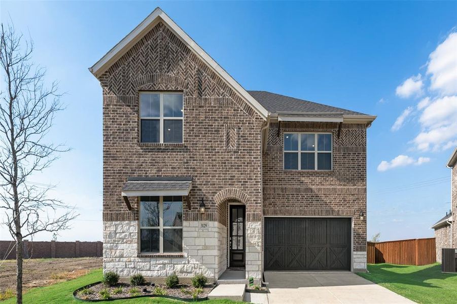 Front exterior of a new home in Arbors at Legacy Hills, Celina, TX, highlighting curb appeal (Image 2). Front exterior of a new home in Arbors at Legacy Hills, Celina, TX, highlighting curb appeal (Image 2).