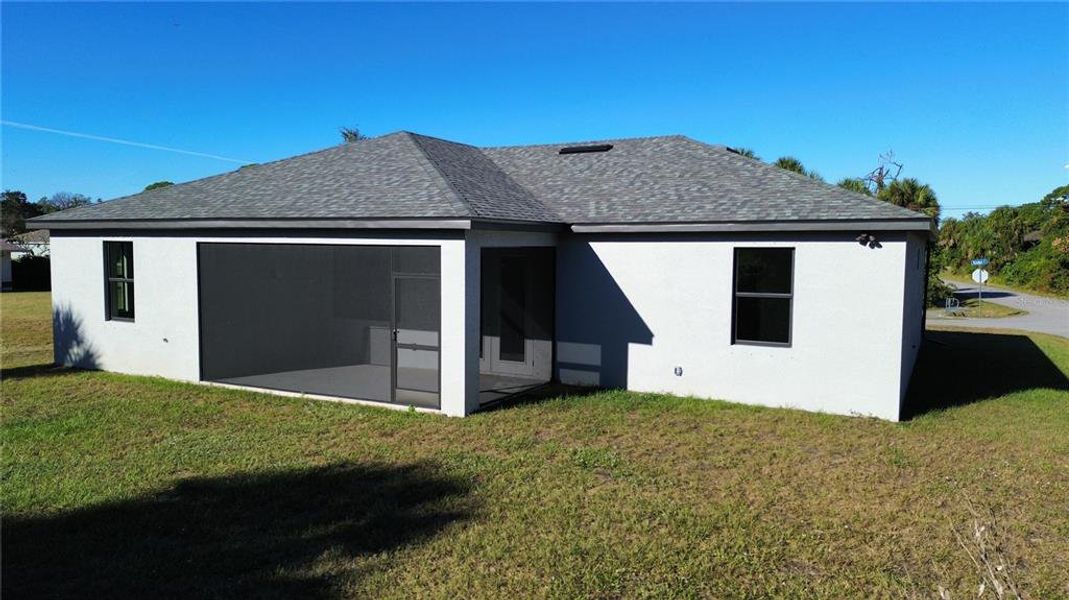 Exterior details and patio area of a home in , North Port (Image 16).
