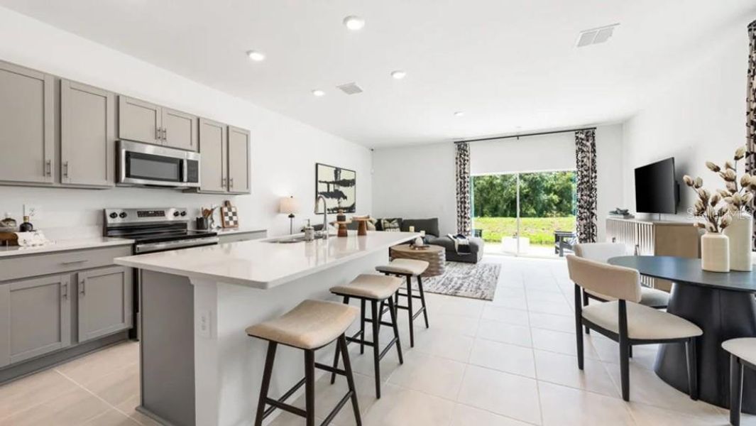 Furnished interior view inside a new home in The Townhomes at Azario Lakewood Ranch, Bradenton (Image 14).