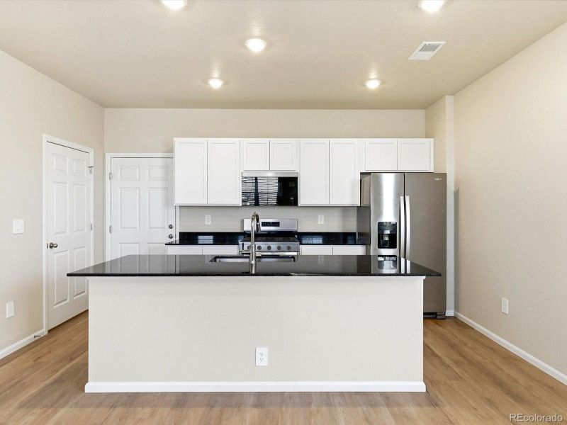Furnished interior view inside a new home in , Aurora (Image 6).