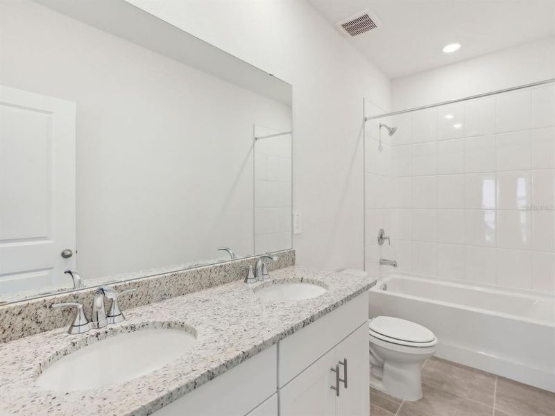 Furnished interior view inside a new home in Two Rivers - Premier Series, Zephyrhills (Image 9). Furnished interior view inside a new home in Two Rivers - Premier Series, Zephyrhills (Image 9).