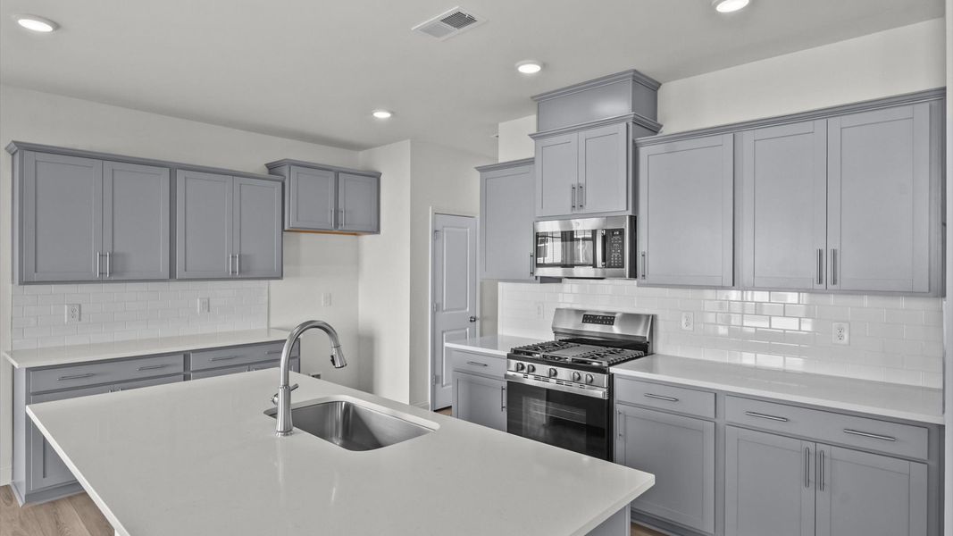 Representative furnished interior of a home built from the Jasmine by DRB Homes in Essex Village, Franklinton (Image 11).